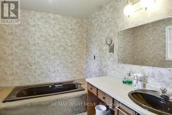 Primary ensuite bathroom. - 