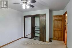 Closet in 2nd bedroom has built-in shelving. - 