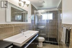 Remodeled main bathroom; double floating vanity. - 
