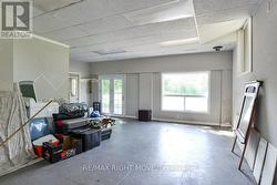 This would be a great home gym; tall ceilings. - 