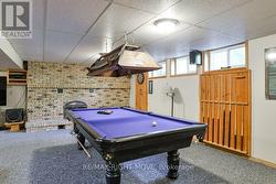 Pool table; 2nd brick wood burning fireplace. - 