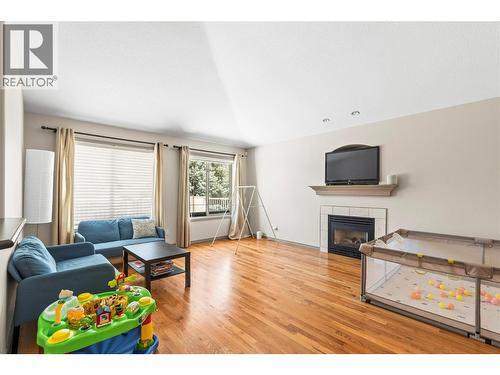 2068 Hunter Crescent, Armstrong, BC - Indoor Photo Showing Living Room With Fireplace