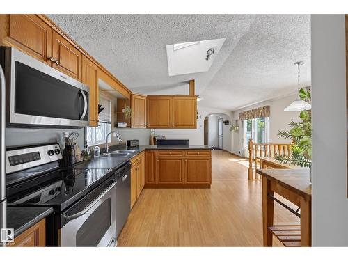 547 Evergreen Park Nw, Edmonton, AB - Indoor Photo Showing Kitchen With Double Sink