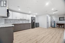 Bachelor Apartment - Modern kitchen with separate hot water tank, HVAC and bathroom - 