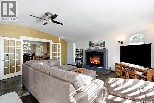 308 3Rd Street W, Delisle, SK - Indoor Photo Showing Living Room With Fireplace