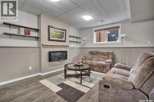 412 Lyle Crescent, Warman, SK - Indoor Photo Showing Living Room With Fireplace