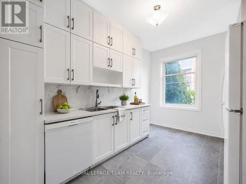 Virtually Staged - 301 Somerset Street E, Ottawa, ON - Indoor Photo Showing Kitchen With Double Sink