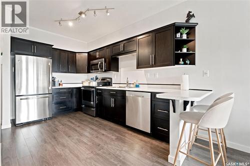 214 545 Hassard Close, Saskatoon, SK - Indoor Photo Showing Kitchen With Stainless Steel Kitchen With Upgraded Kitchen