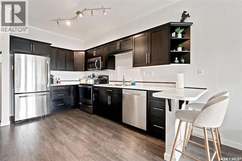 214 545 Hassard Close, Saskatoon, SK - Indoor Photo Showing Kitchen With Stainless Steel Kitchen
