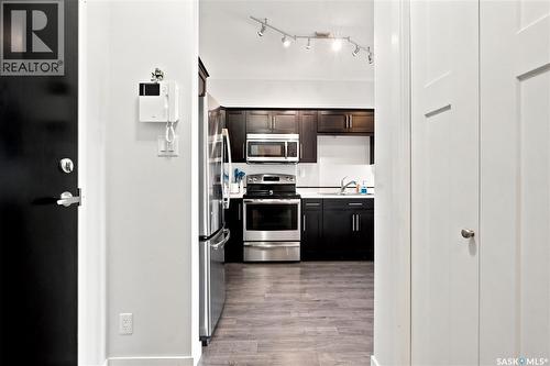 214 545 Hassard Close, Saskatoon, SK - Indoor Photo Showing Kitchen With Stainless Steel Kitchen With Double Sink