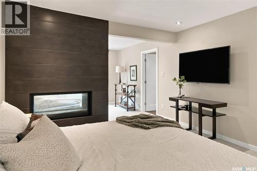 3834 Balfour Place, Saskatoon, SK - Indoor Photo Showing Bedroom With Fireplace