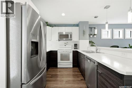 143 1920 7Th Avenue E, Regina, SK - Indoor Photo Showing Kitchen With Stainless Steel Kitchen With Double Sink