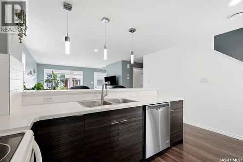 143 1920 7Th Avenue E, Regina, SK - Indoor Photo Showing Kitchen With Double Sink