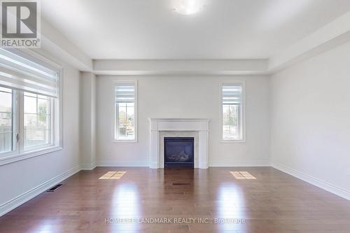 1533 Devine Point, Milton, ON - Indoor Photo Showing Living Room With Fireplace