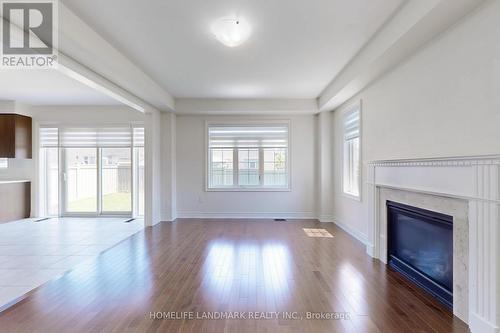 1533 Devine Point, Milton, ON - Indoor Photo Showing Living Room With Fireplace