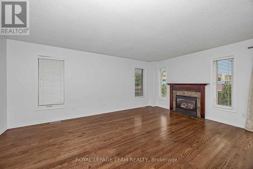 323 Freedom Private, Ottawa, ON - Indoor Photo Showing Living Room With Fireplace