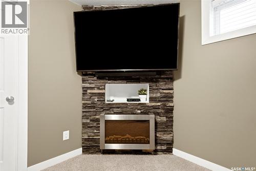 3513 Green Bank Road, Regina, SK - Indoor Photo Showing Other Room With Fireplace