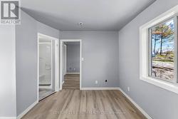 Entry to bathroom on left, and entry to bedroom - 
