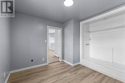 Bedroom with built-in storage shelving - 
