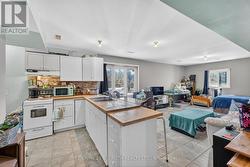 Upper Residential Unit - Kitchen & Living Room - 