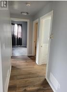 Lower Level - Hall to Bathroom and Rooms - 