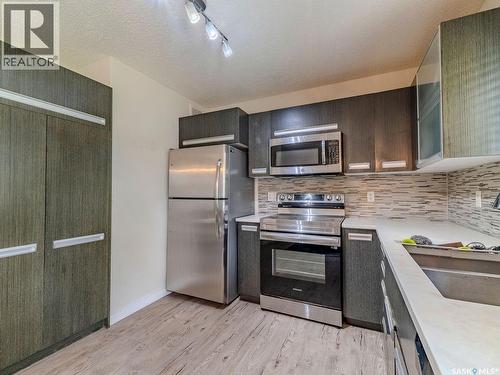 143 135 Ashworth Crescent, Saskatoon, SK - Indoor Photo Showing Kitchen With Upgraded Kitchen
