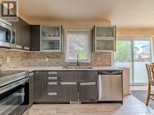 143 135 Ashworth Crescent, Saskatoon, SK - Indoor Photo Showing Kitchen With Double Sink