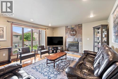 2648 Fleming, Windsor, ON - Indoor Photo Showing Living Room With Fireplace