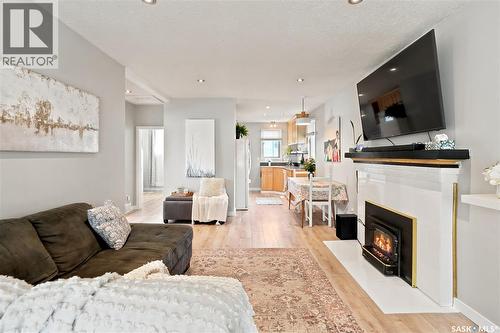 2209 Queen Street, Regina, SK - Indoor Photo Showing Living Room With Fireplace