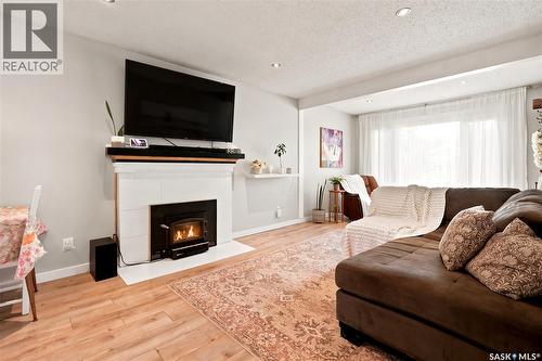 2209 Queen Street, Regina, SK - Indoor Photo Showing Living Room With Fireplace