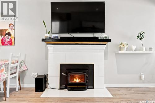 2209 Queen Street, Regina, SK - Indoor Photo Showing Living Room With Fireplace