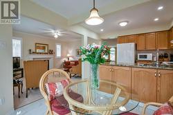 Open concept eat-in kitchen with main floor family - 