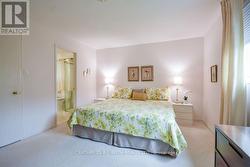 Primary bedroom with W/I closet and ensuite bath - 