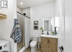 Lower level 3 pc bath with second laundry unit - 