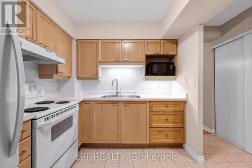 216 - 115 Bonis Avenue, Toronto, ON - Indoor Photo Showing Kitchen With Double Sink