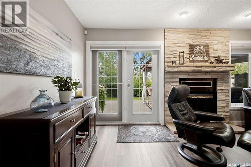 18 Forman Bay, Regina, SK - Indoor With Fireplace