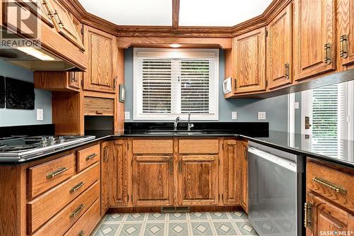 711 Whitewood Court, Saskatoon, SK - Indoor Photo Showing Kitchen With Double Sink