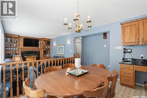 711 Whitewood Court, Saskatoon, SK - Indoor Photo Showing Dining Room With Fireplace