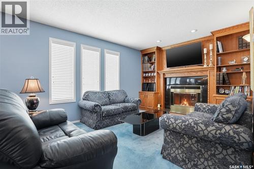 711 Whitewood Court, Saskatoon, SK - Indoor Photo Showing Living Room With Fireplace