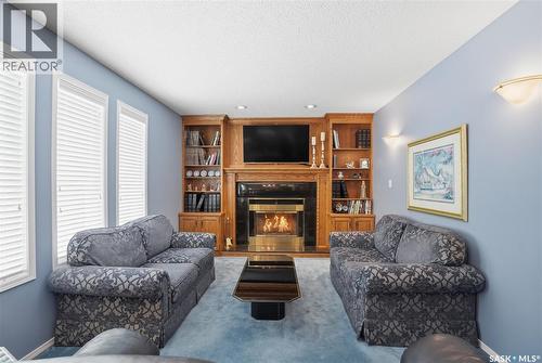 711 Whitewood Court, Saskatoon, SK - Indoor Photo Showing Living Room With Fireplace