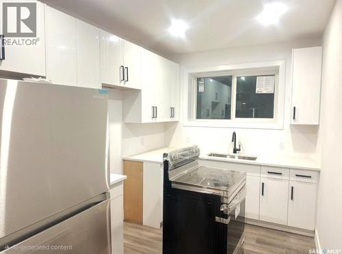 226 Nightingale Road, Saskatoon, SK - Indoor Photo Showing Kitchen With Double Sink