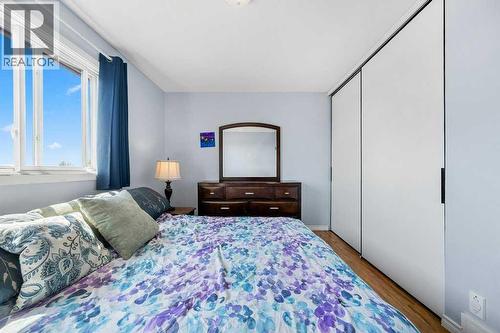 lots of closet space - 80, 1055 72 Avenue Nw, Calgary, AB - Indoor Photo Showing Bedroom