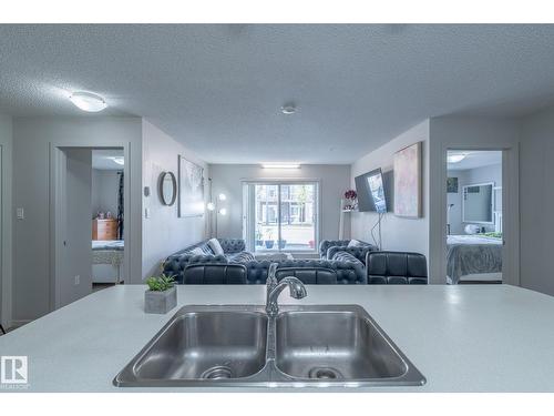#107 142 Ebbers Bv Nw, Edmonton, AB - Indoor Photo Showing Kitchen With Double Sink