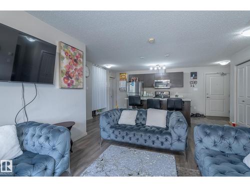 #107 142 Ebbers Bv Nw, Edmonton, AB - Indoor Photo Showing Living Room