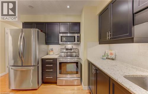 555 Chablis Drive Unit# 12, Waterloo, ON - Indoor Photo Showing Kitchen With Stainless Steel Kitchen With Upgraded Kitchen