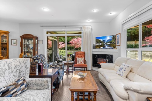 #100-439 College Rd, Qualicum Beach, BC - Indoor Photo Showing Living Room With Fireplace
