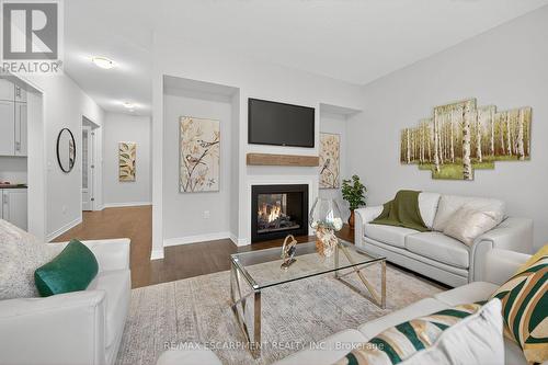 67 Starfire Crescent, Hamilton, ON - Indoor Photo Showing Living Room With Fireplace