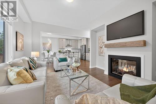 67 Starfire Crescent, Hamilton, ON - Indoor Photo Showing Living Room With Fireplace