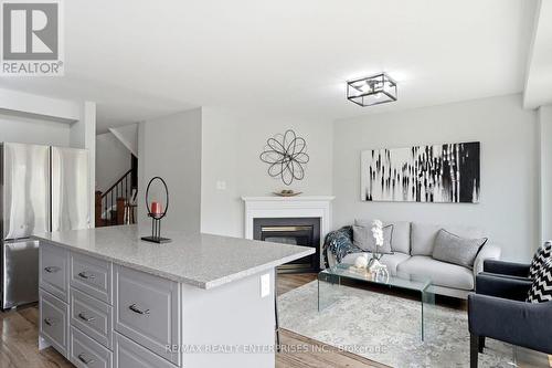 6930 Elliott Parliament Street, Mississauga, ON - Indoor Photo Showing Living Room With Fireplace