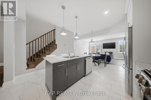 107 Stephenson Way, Minto, ON - Indoor Photo Showing Kitchen With Double Sink